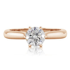 A classic diamond engagement ring from the top perspective with petals leading up to set the centre stone, With a secret diamonds on the side.