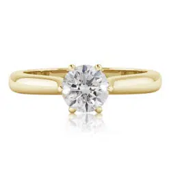 A classic diamond engagement ring from the top perspective with petals leading up to set the centre stone, With a secret diamonds on the side.