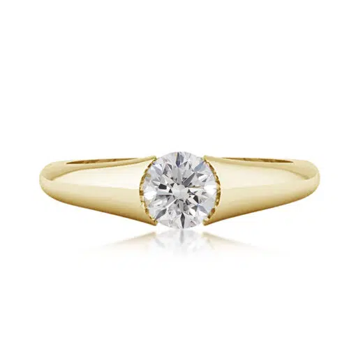 A modern style diamond ring with a diamond tension set in the centre, the ring also has under rail for extra strength.